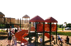 playset with kids running around